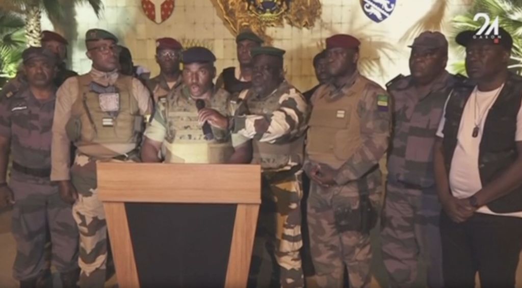 Gabonese army officers appear on national television on 30 August to announce that they have seized power (Gabon National Television/Anadolu Agency via Getty Images)