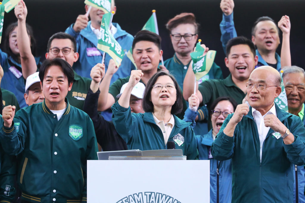 Tsai Ing-wen, Taiwan’s president, centre, during a rally alongside Vice-President and DPP presidential candidate Lai Ching-te, left (I-Hwa Cheng/Bloomberg via Getty Images)