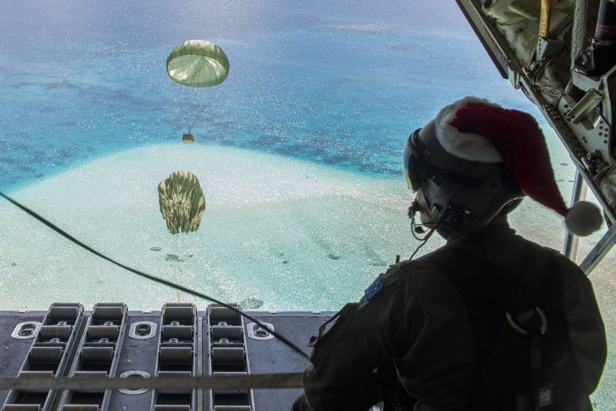 Royal Australian Air Force drops Christmas bundles of humanitarian aid to the atoll of Kapingamarangi, Federated States of Micronesia (Matthew Gilmore/US Air Force)