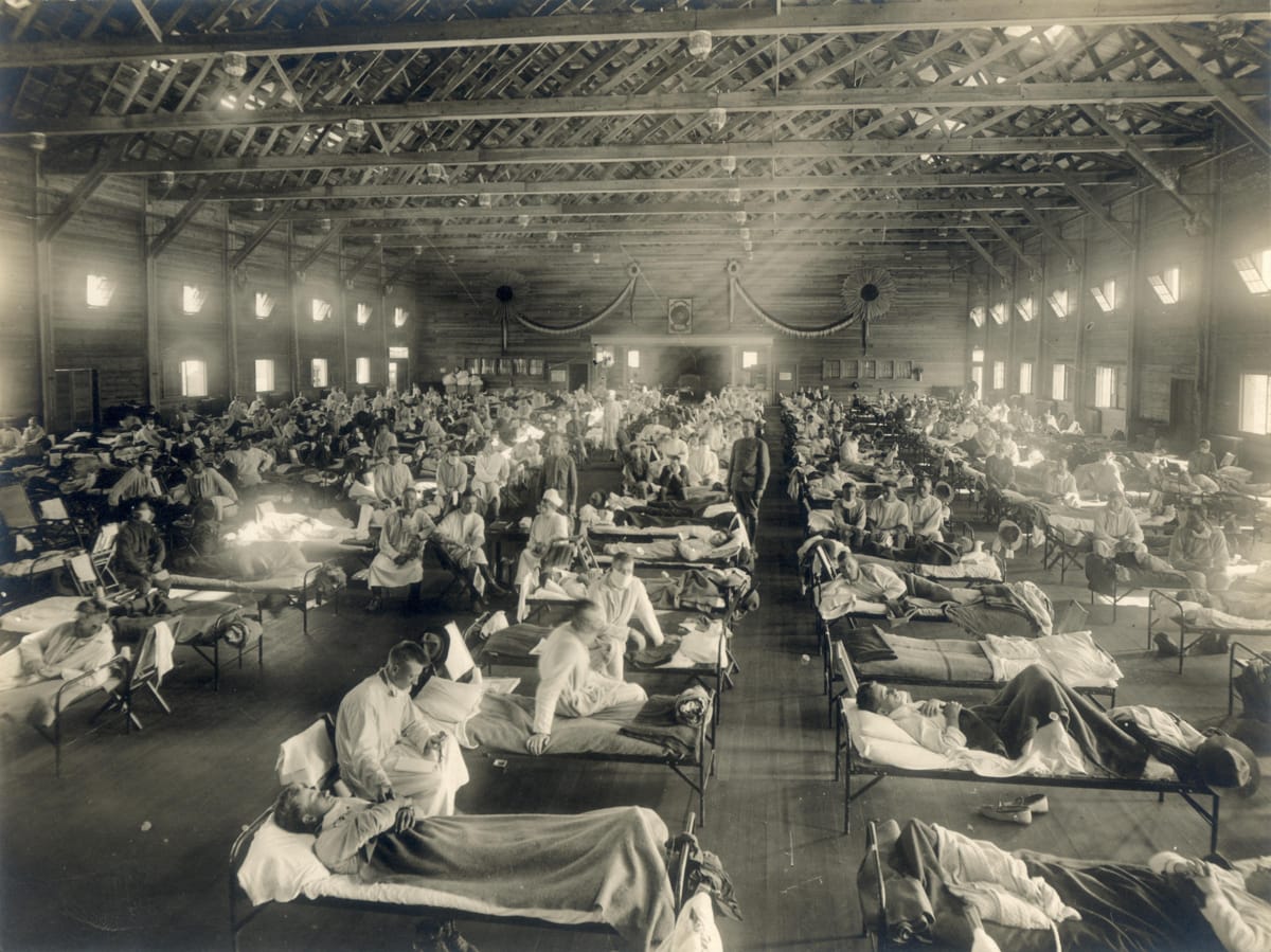 A make-shift hospital in Kansas, United States, in 1918 during Spanish flu epidemic (OHA 250: New Contributed Photographs Collection, Otis Historical Archives, National Museum of Health and Medicine via WikiMedia Commons)