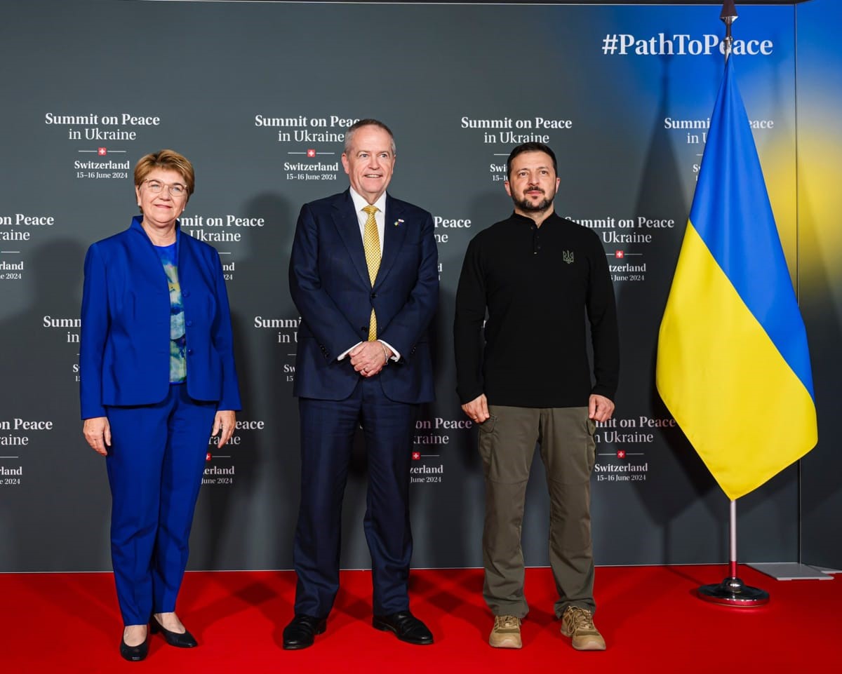 Swiss President Viola Amherd, left, NDIS minister Bill Shorten and Ukrainian President Volodymyr Zelenskyy at the peace summit in Switzerland (@AusAmbCH/X)