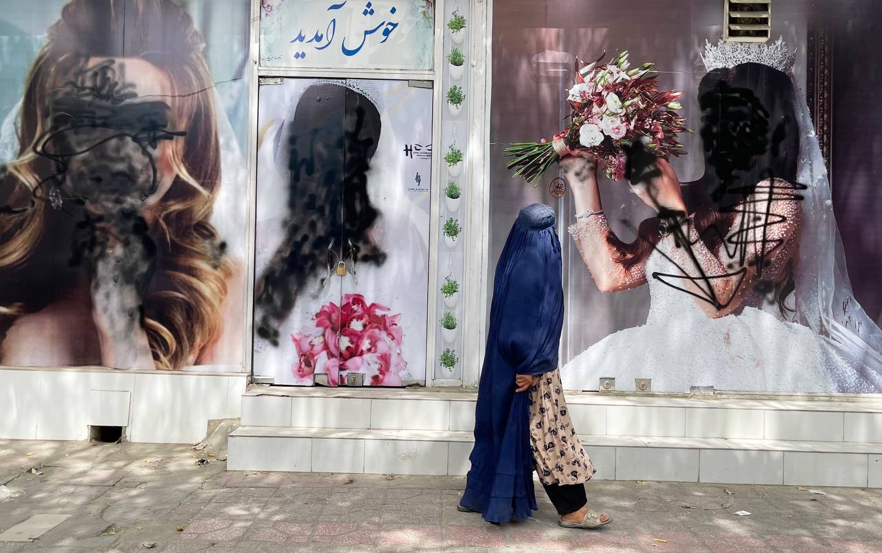 Women posters on beauty salon windows vandalized in Kabul, Afghanistan on 20 August 2021 (Haroon Sabawoon/Anadolu Agency via Getty Images)