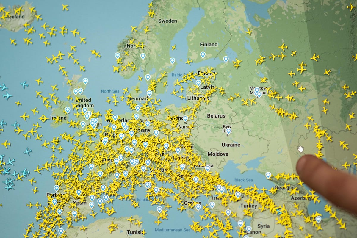 The Flightradar 24 website shows civilian flights in Europe avoiding Ukraine airspace just after Russia launched its full-scale invasion in February 2022 (Loic Venance/AFP via Getty Images)