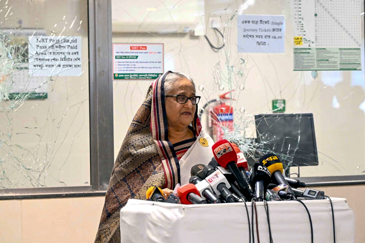 Sheikh Hasina appearing last month at a metro station in Mirpur damaged during anti-government protests (Bangladesh Prime Minister's Office via AFP/Getty Images)