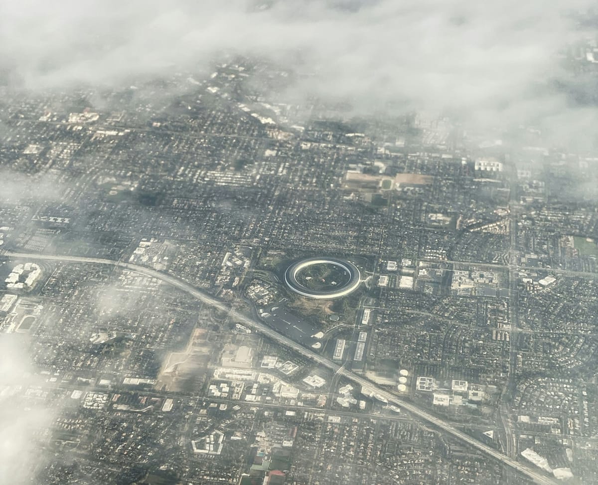 An aerial view of Silicon Valley, California, with Apple Park, headquarters of Apple Inc in centre (Amit Lahav/Unsplash)