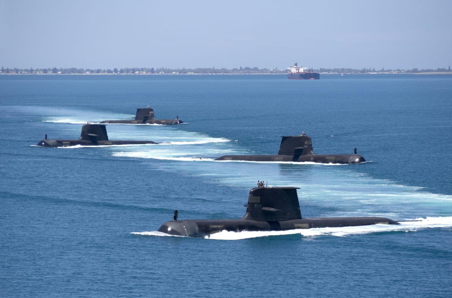 Australian Collins class submarines transiting through Cockburn Sound, Western Australia, which will be an expanded base for the new nuclear-powered boats (Chris Prescott/Defence Department)