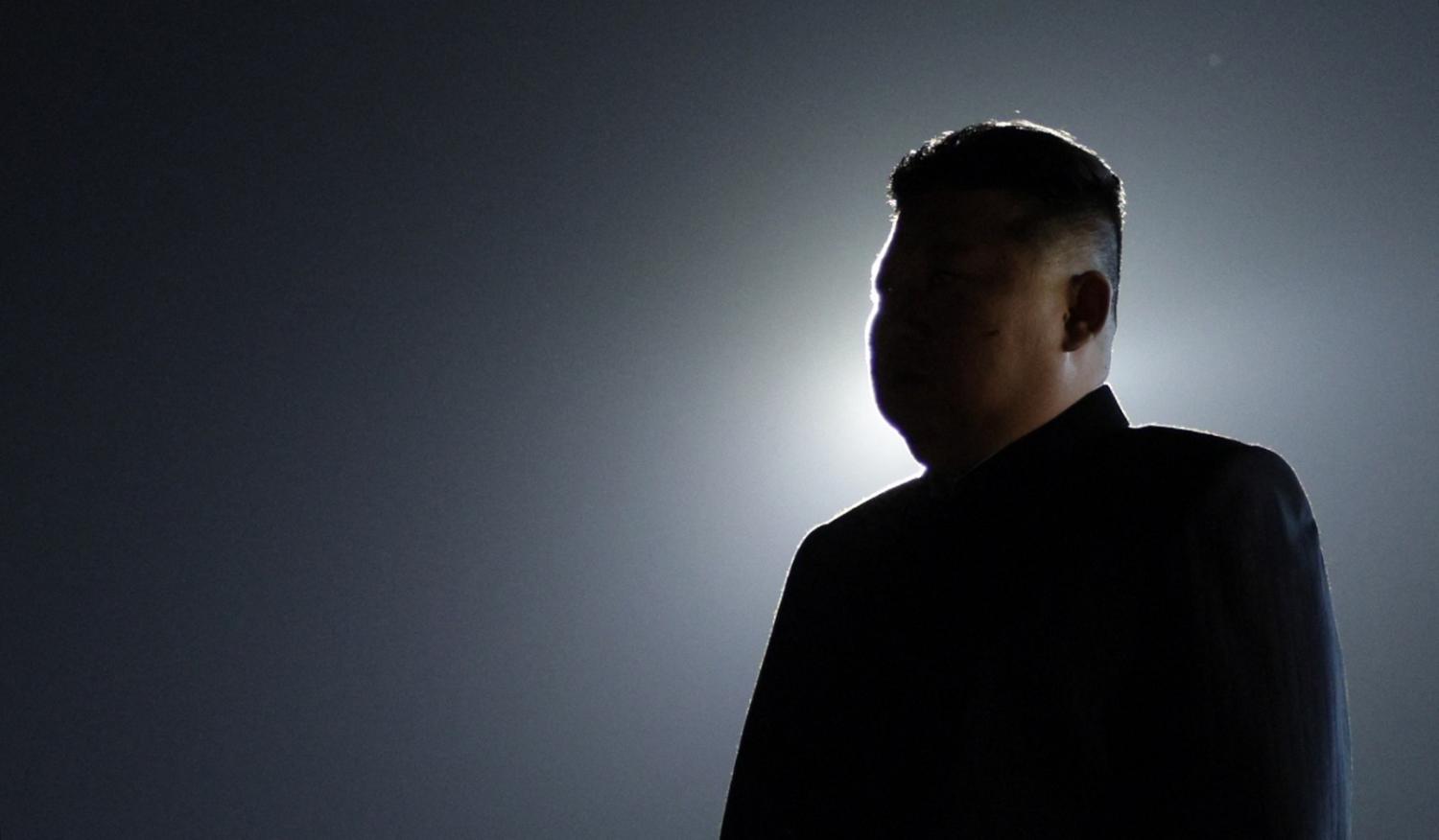 North Korea’s Kim Jong-un awaits the arrival of Russian President Vladimir Putin during a welcome ceremony at Pyongyang Airport, 19 June 2024 (Gavril Grigorov/AFP via Getty Images)