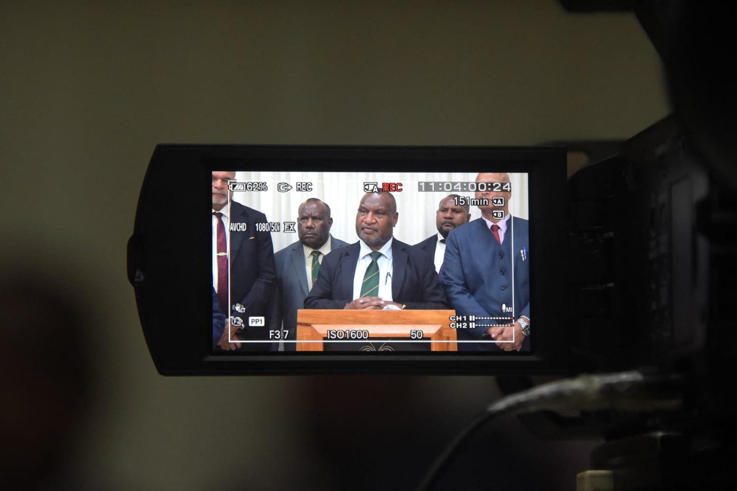 Papua New Guinea's Prime Minister James Marape, centre, during a press conference after a parliament session in Port Moresby on 5 June 2024 (Andrew Kutan/AFP via Getty Images)