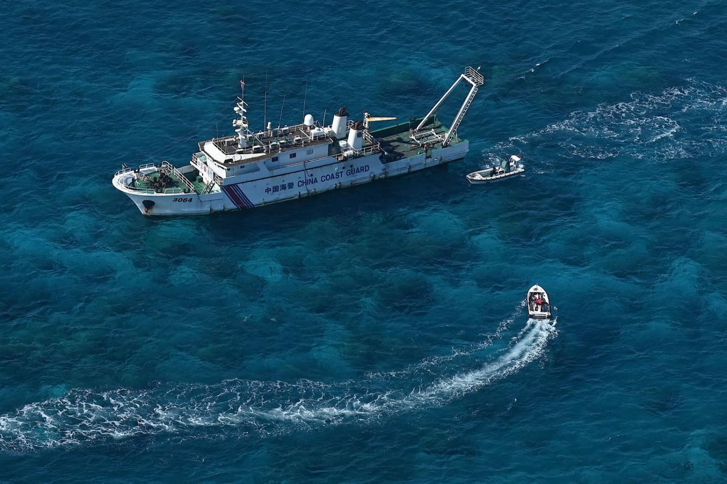 A China Coast Guard vessel at Scarborough Shoal in the disputed South China Sea on 15 February 2024, (Jam Sta Rosa/Getty Images)