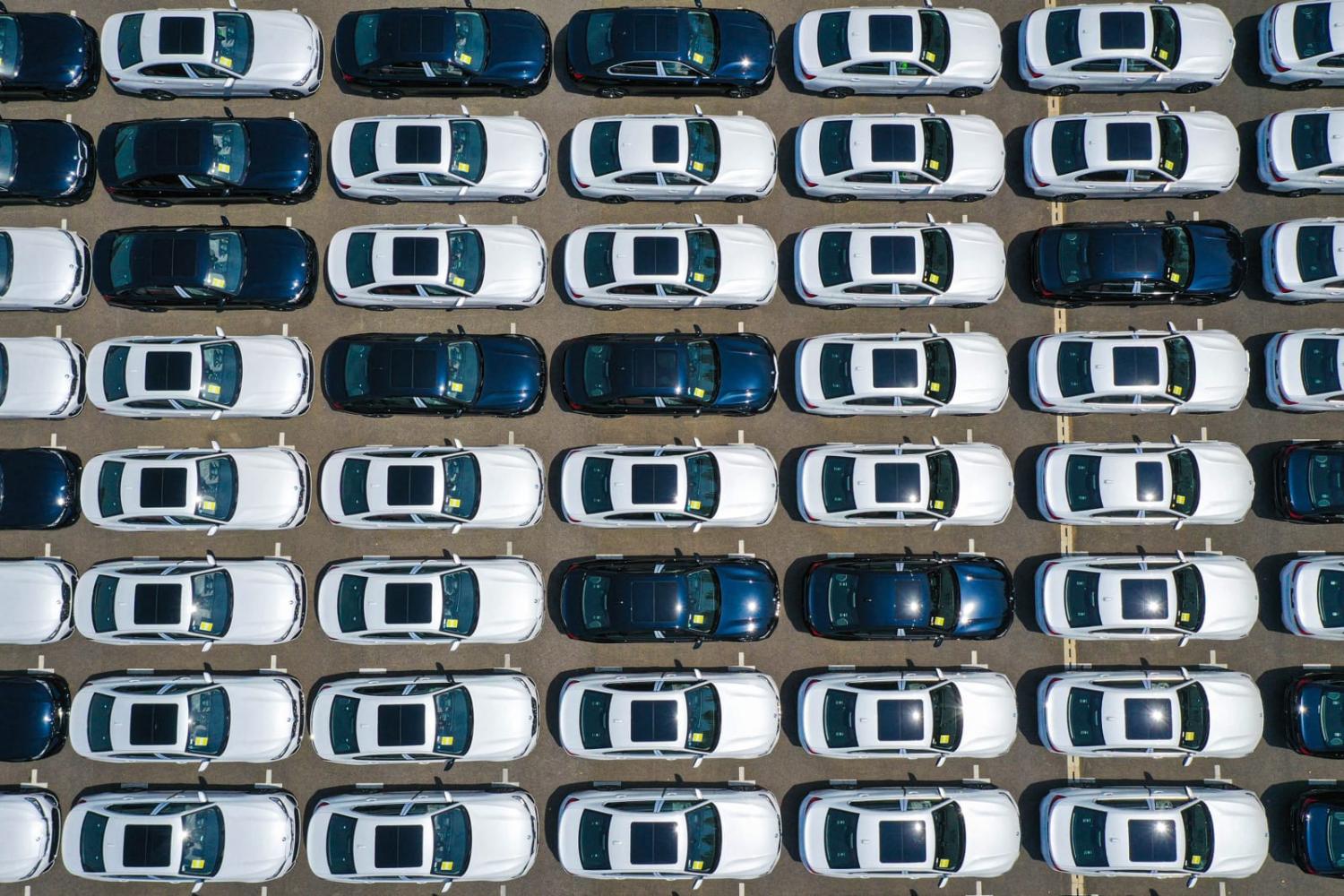 Newly-produced BMW cars parked at a factory in Shenyang, in China's northeastern Liaoning province (AFP via Getty Images)