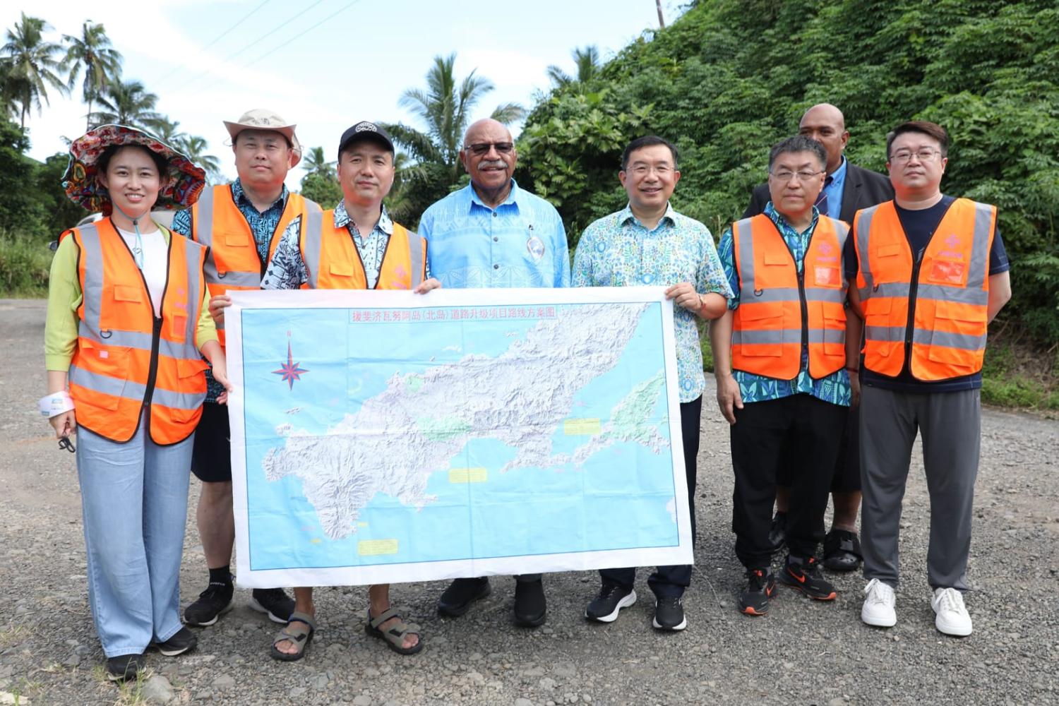 Fijian Prime Minister Sitiveni Rabuka, fourth left, and and China's ambassador to Fiji Zhou Jian, fifth left, in April visiting the road upgrade project in Vanua Levu, Fiji (Sang Qinlong/Xinhua via Getty Images)