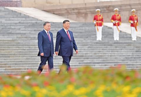 To Lam, left, and Xi Jinping in Beijing last month (Yue Yuewei/Xinhua via Getty Images)