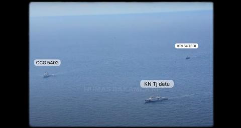 A photo distributed by Indonesia's coast guard showing an encounter with a Chinese vessel