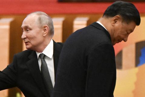 Xi Jinping, right, and Vladimir Putin have built a genuine affection for each other but Russia’s and China’s approach to their security are fundamentally at odds (Pedro Pardo/AFP via Getty Images)