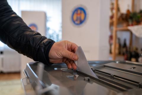 A man casts a ballot at the embassy of the Republic of Moldova in Berlin on 3 November 2024 (Christophe Gateau/picture alliance via Getty Images)