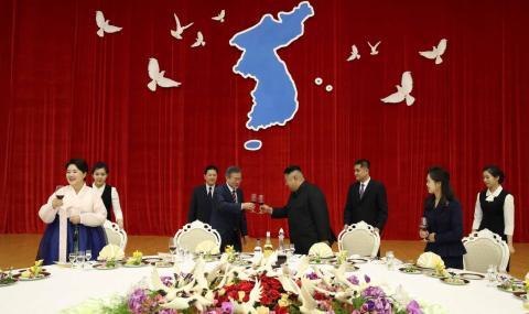 South Korea’s President Moon Jae-in toasts with North Korea’s Kim Jong-un on 18 September in Pyongyang, North Korea (Photo: Pyongyang Press Corps/Getty)